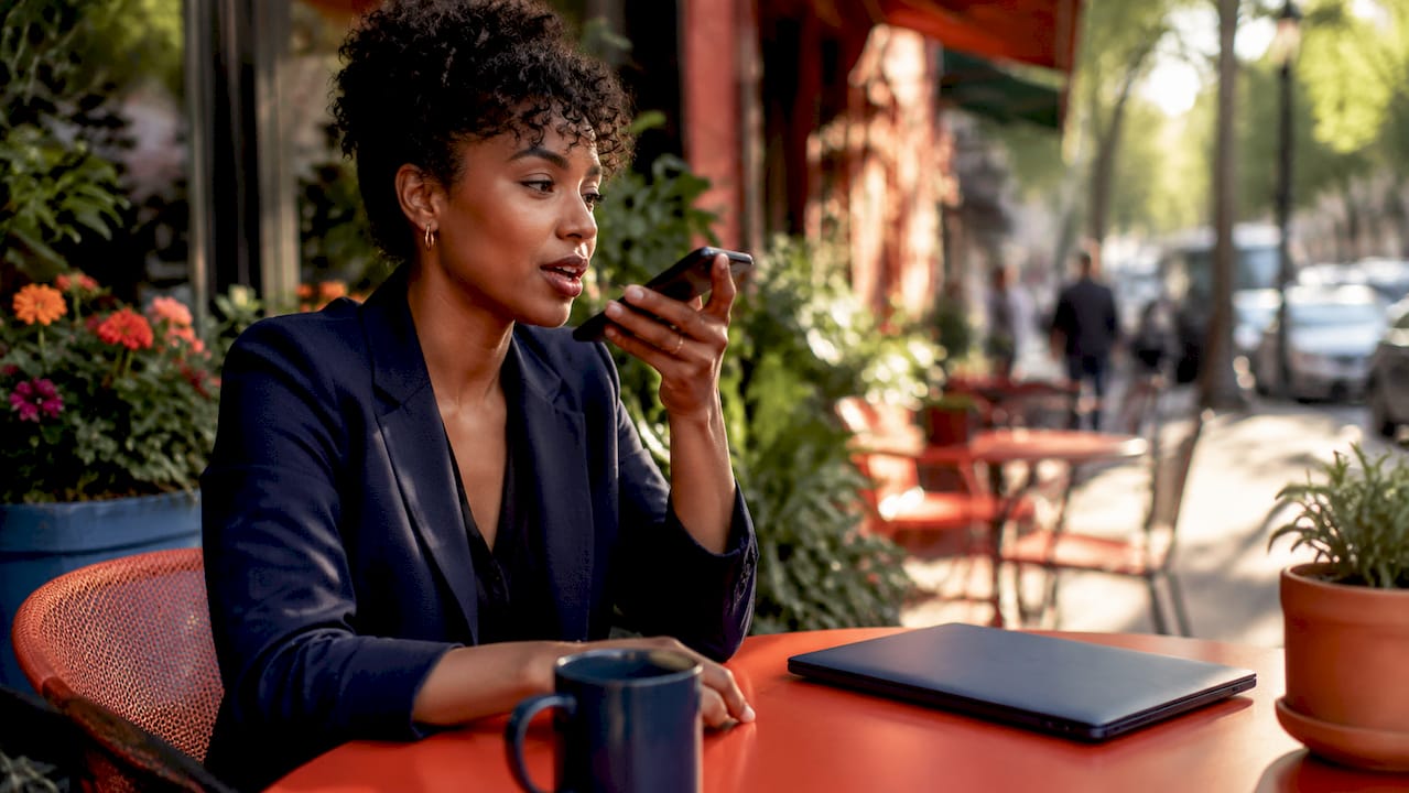 Woman using voice search at home office